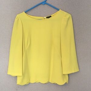 Ann Taylor yellow scalloped blouse.